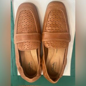 Clark’s brown loafers
